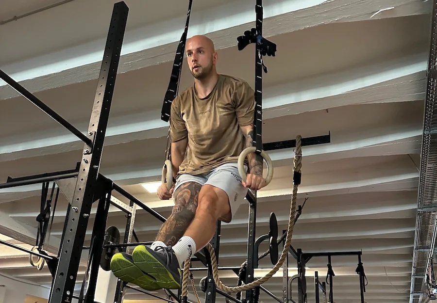 Athlete doing ring muscle-ups