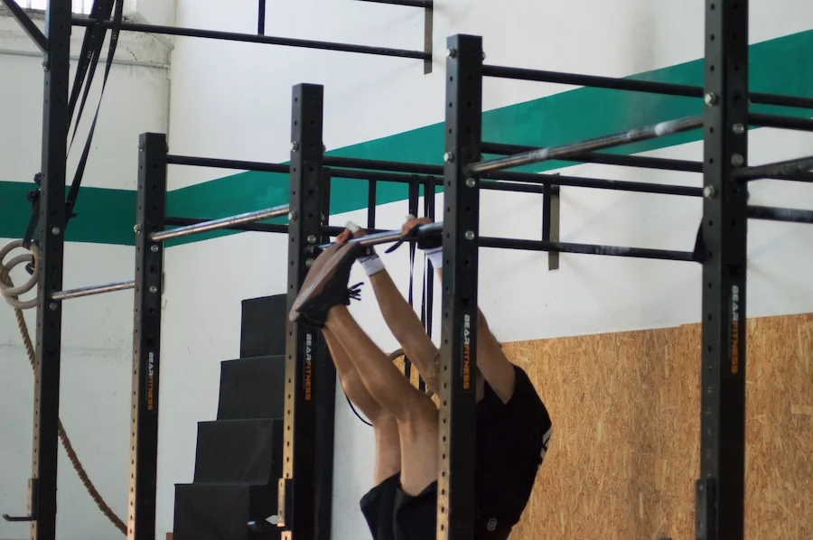 Athlete performing toes-to-bar