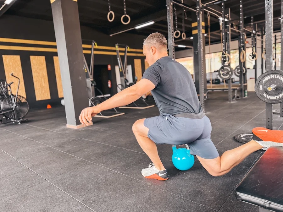 athlete doing Bulgarian split squats