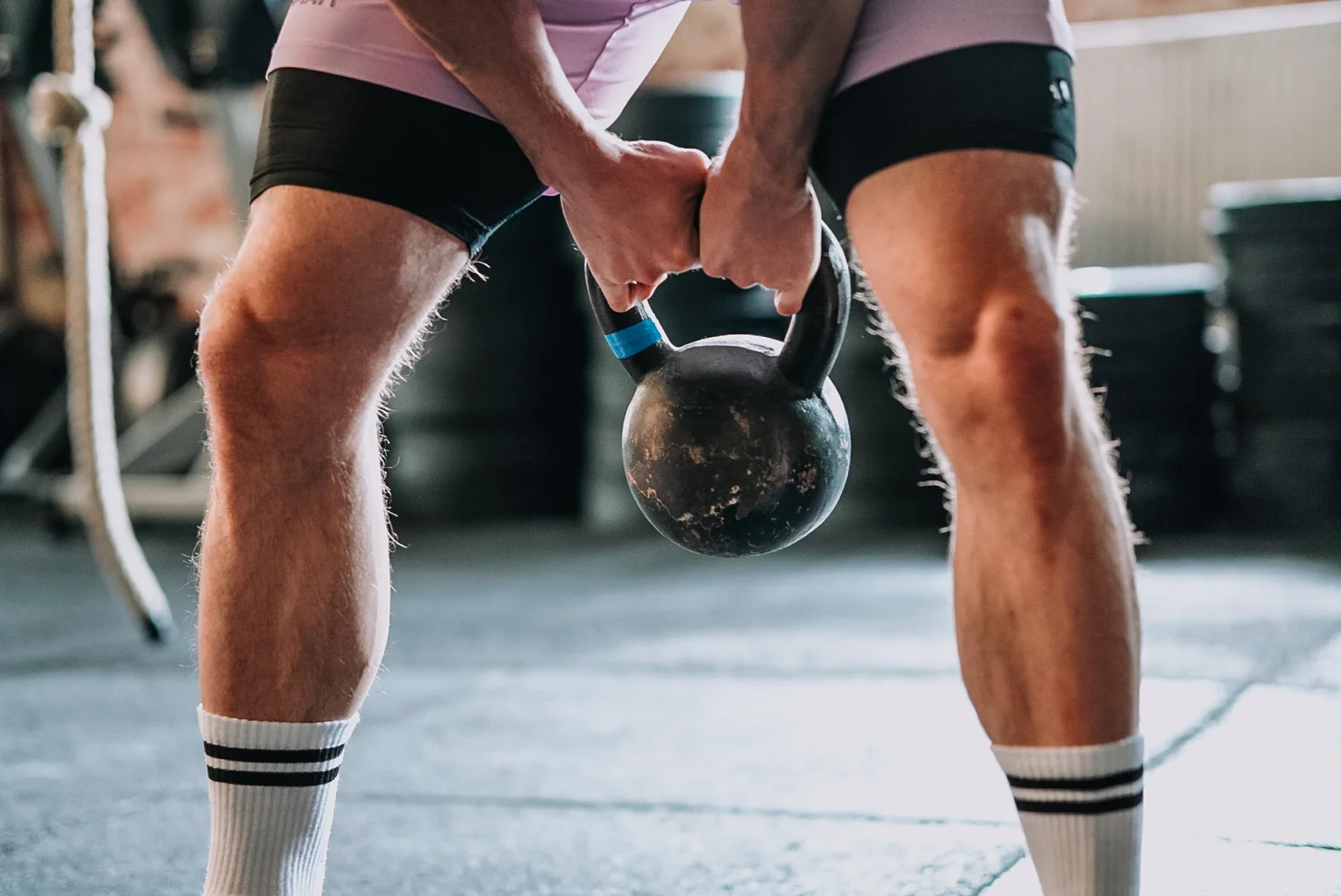 Athlete doing kettlebell swings