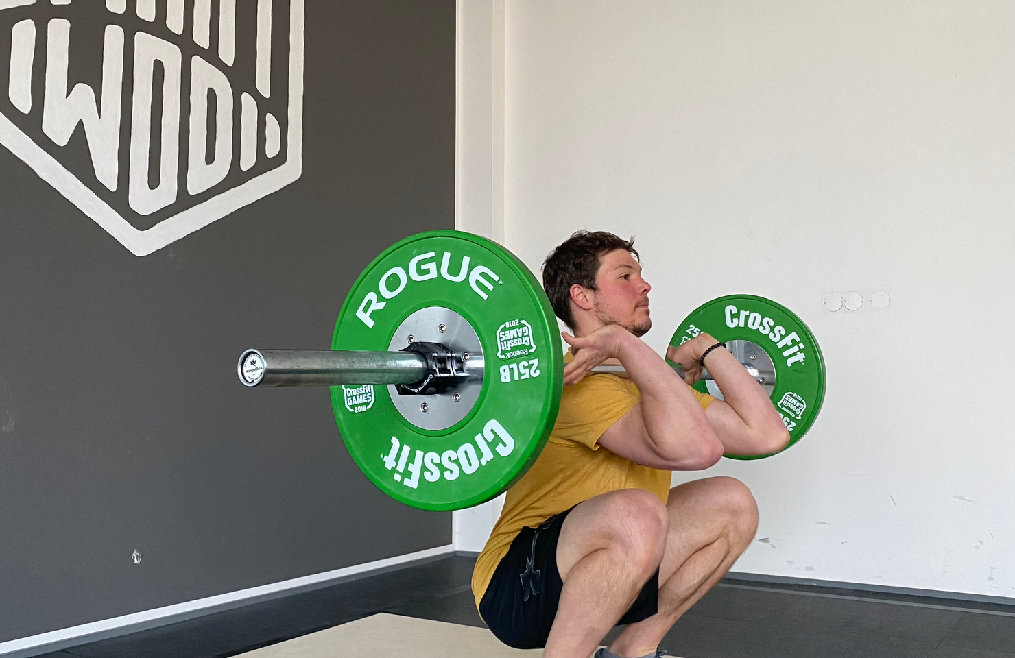 Athlete doing barbell squats