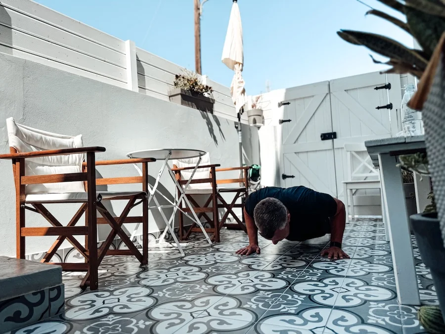 Athlete does push-ups on vacation