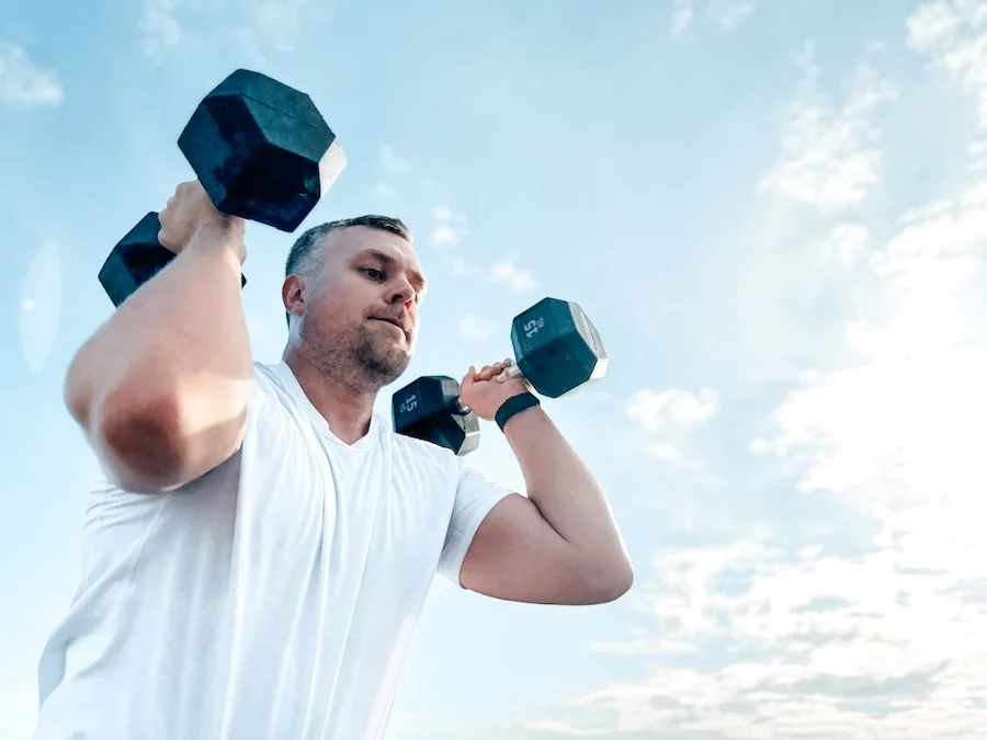 Athlete with dumbbells