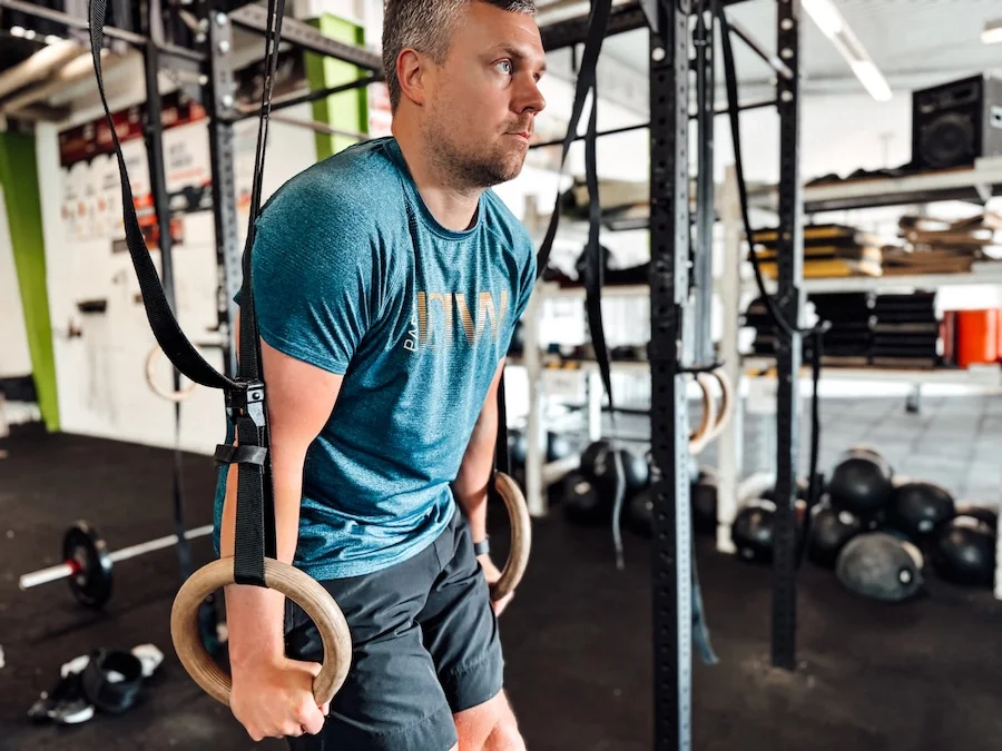 Athlete doing strength training on rings