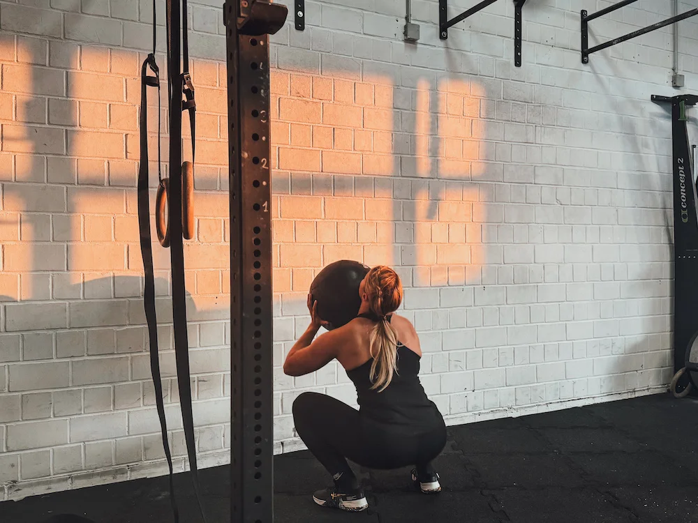 athlete doing wall balls