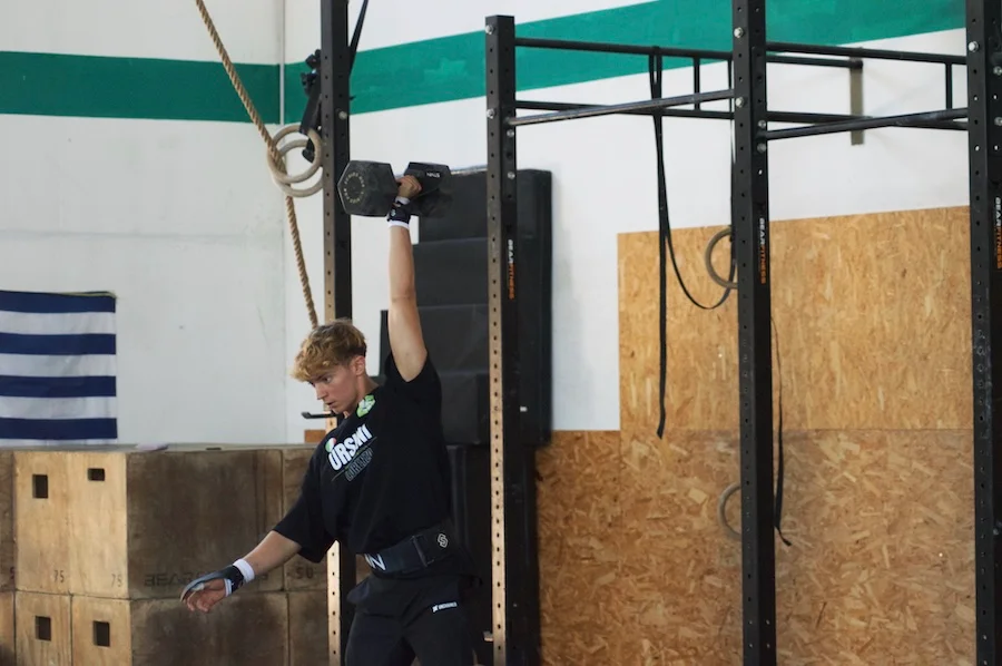 Athlete training with a dumbbell
