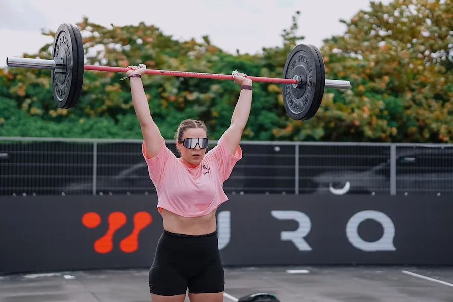 Athlete with a barbell and RX weights