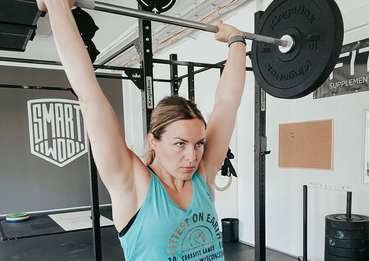 Athlete with a barbell overhead