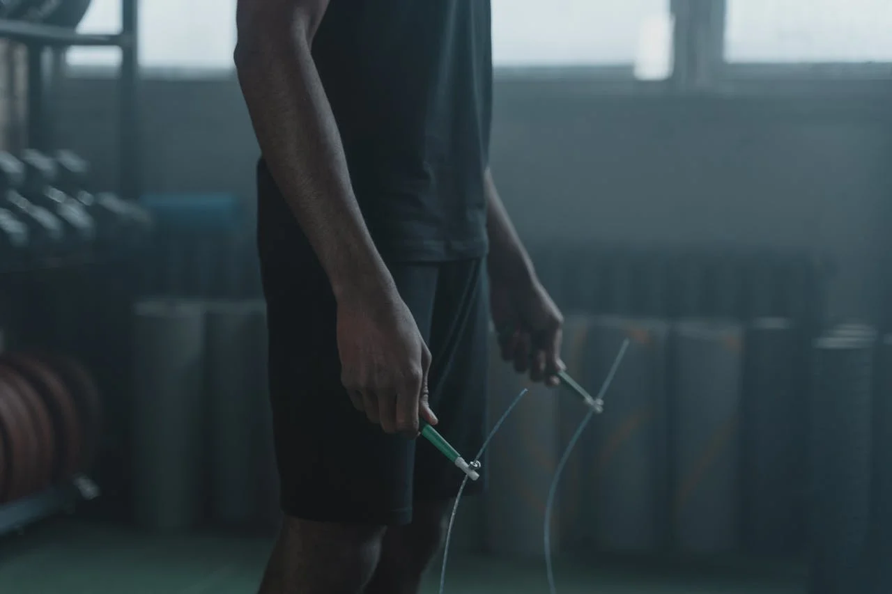 Athlete with a skipping rope in his hand
