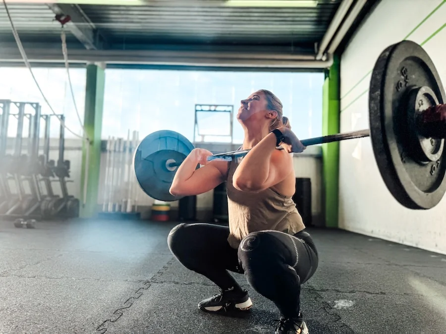 Athletes performing front squats