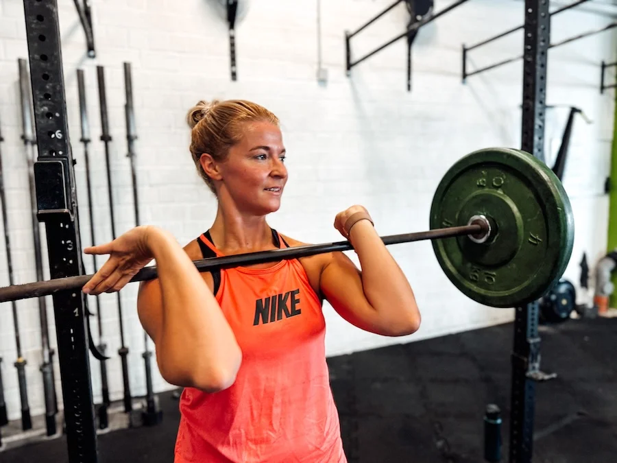 Female athlete with a barbell