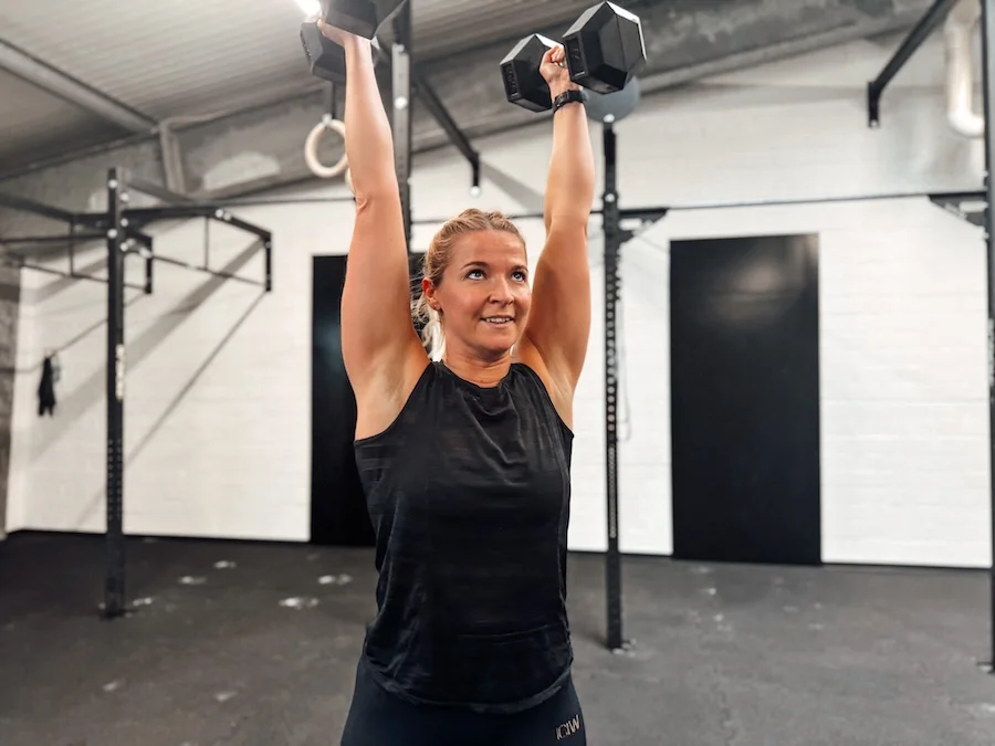 Athlete with dumbbells