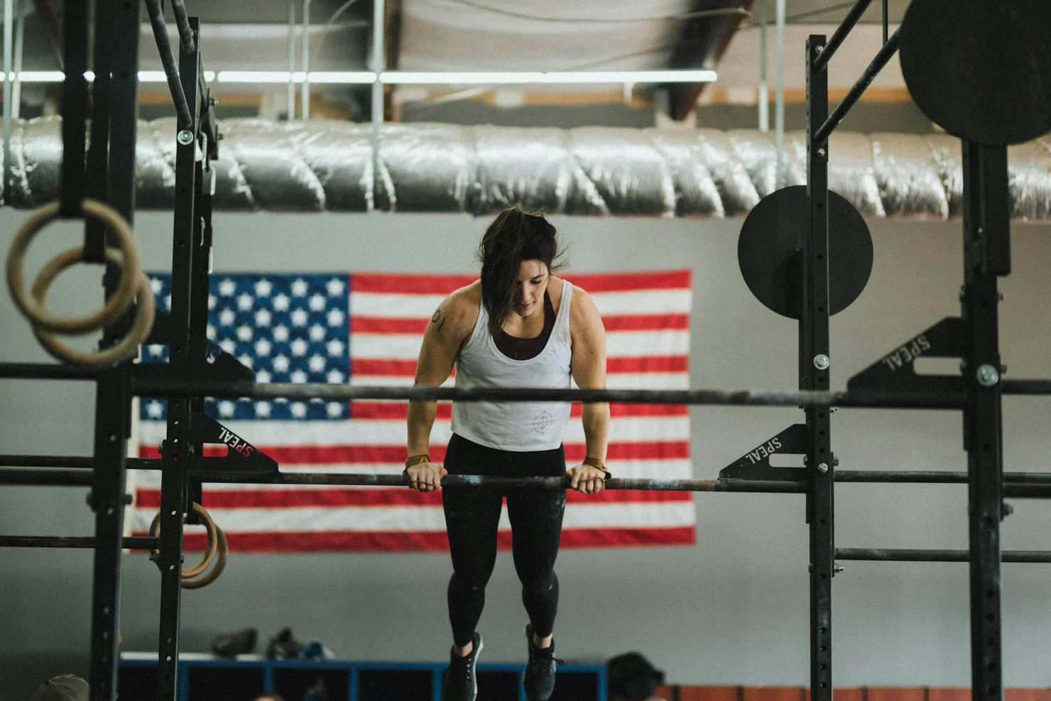 CrossFit athlete doing a bar muscle-up