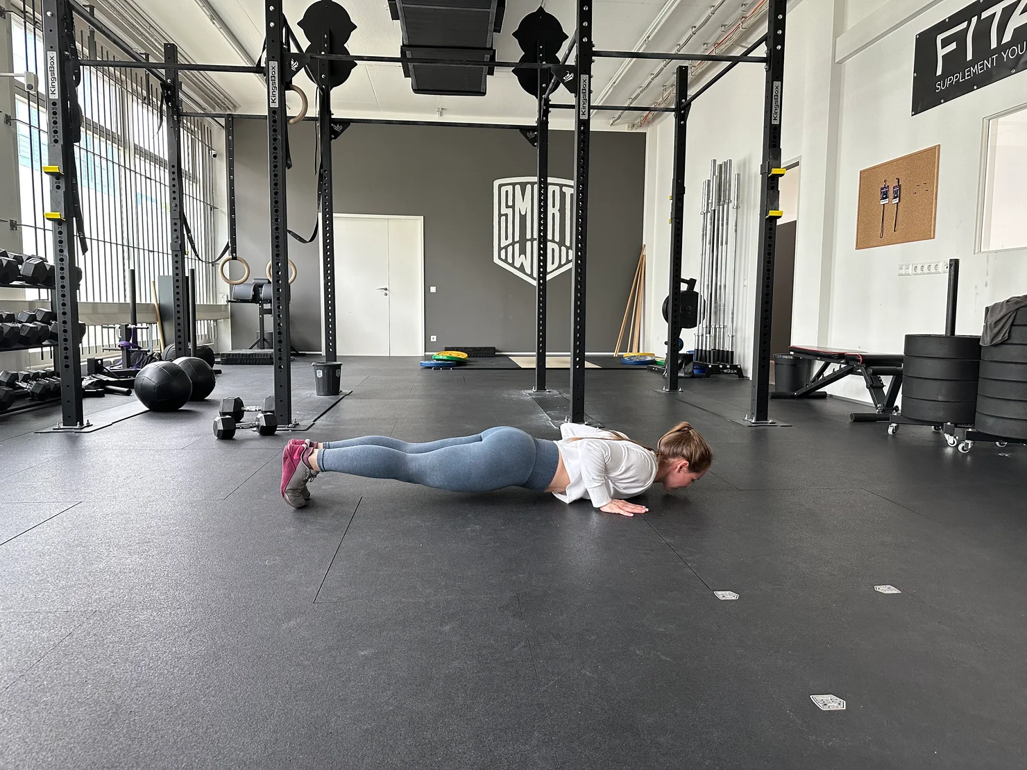 Female athlete doing Burpees