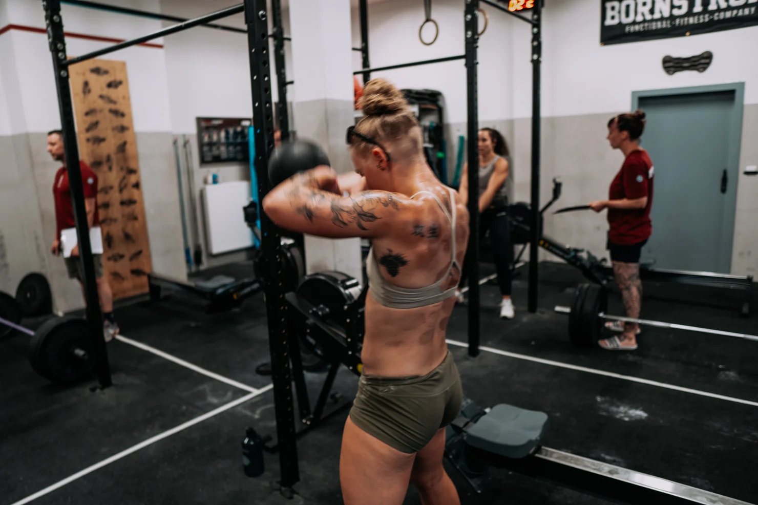 Female athlete doing Kettlebell Swings