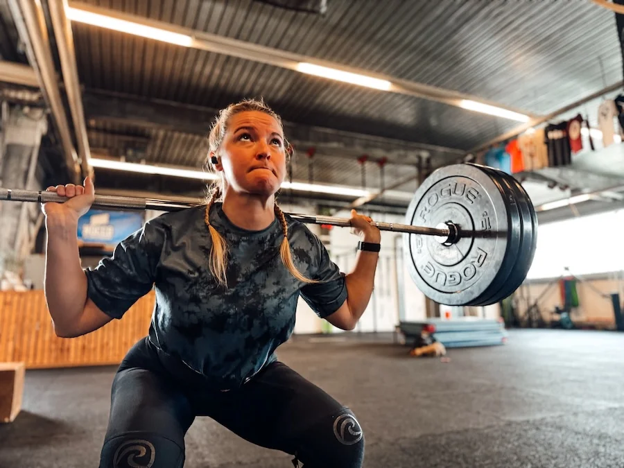 Female athlete doing squats