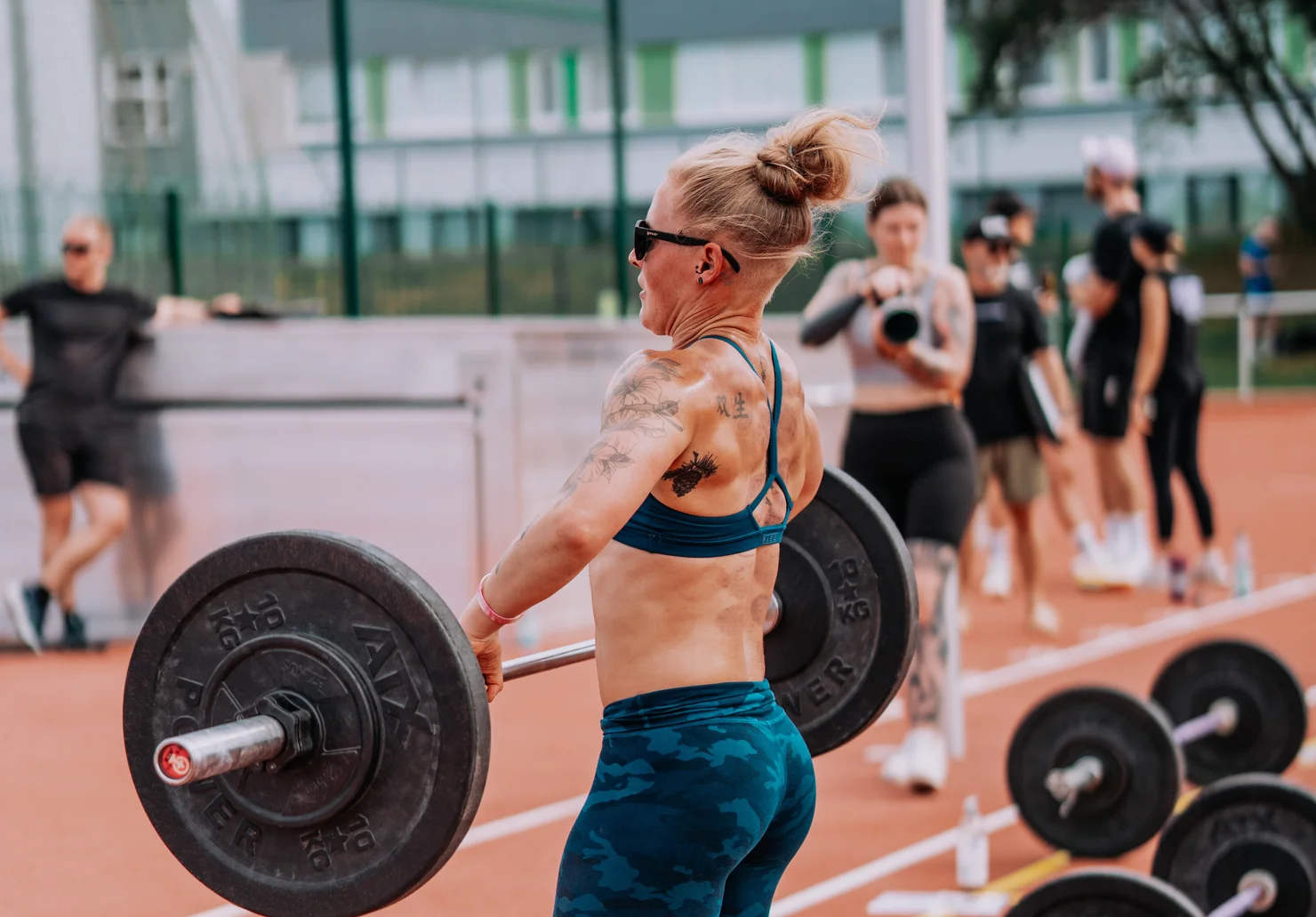 Female athlete training with a barbell