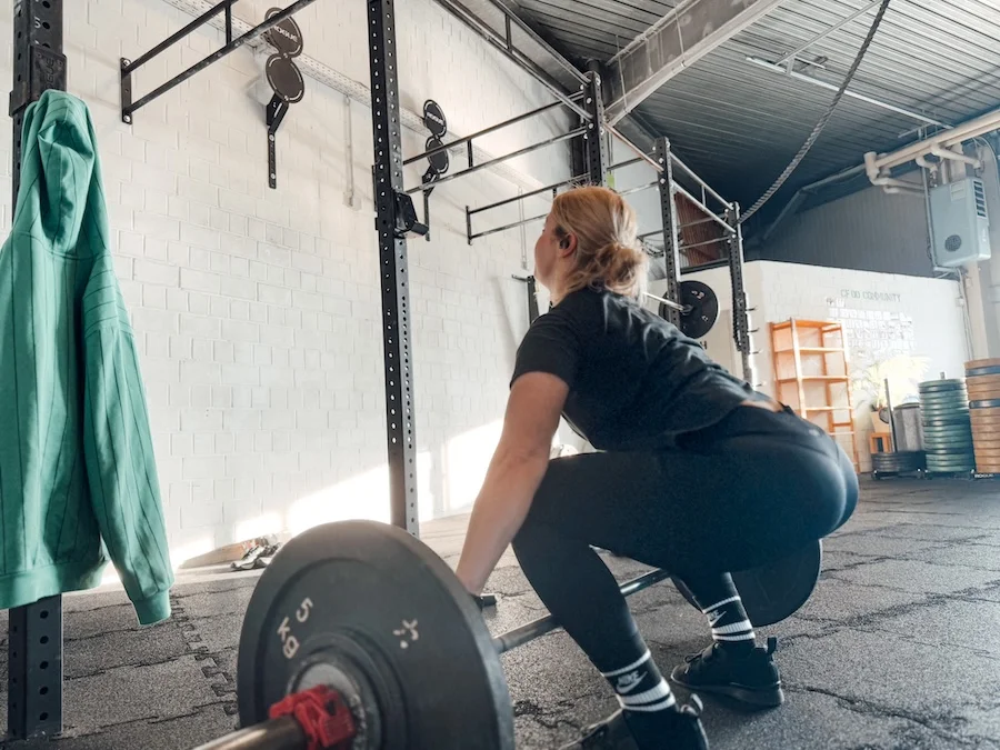 Female athlete with a barbell