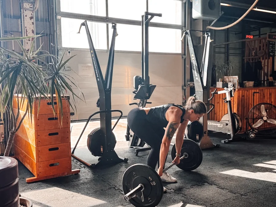 Woman working out with a barbell