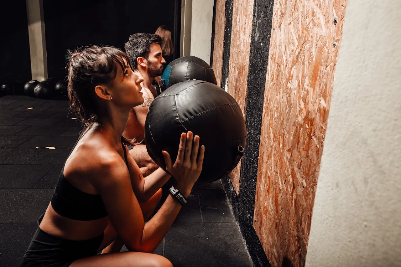 Group of athletes doing wall balls