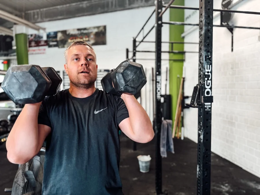 man with dumbbells