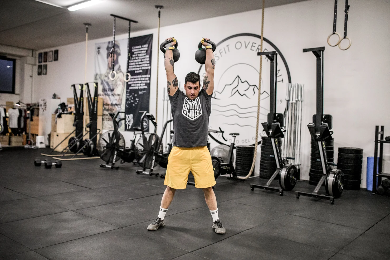 Man working out with kettlebells