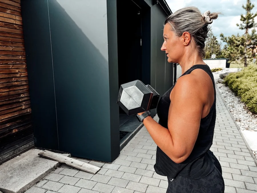 Woman doing strength training with a dumbbell