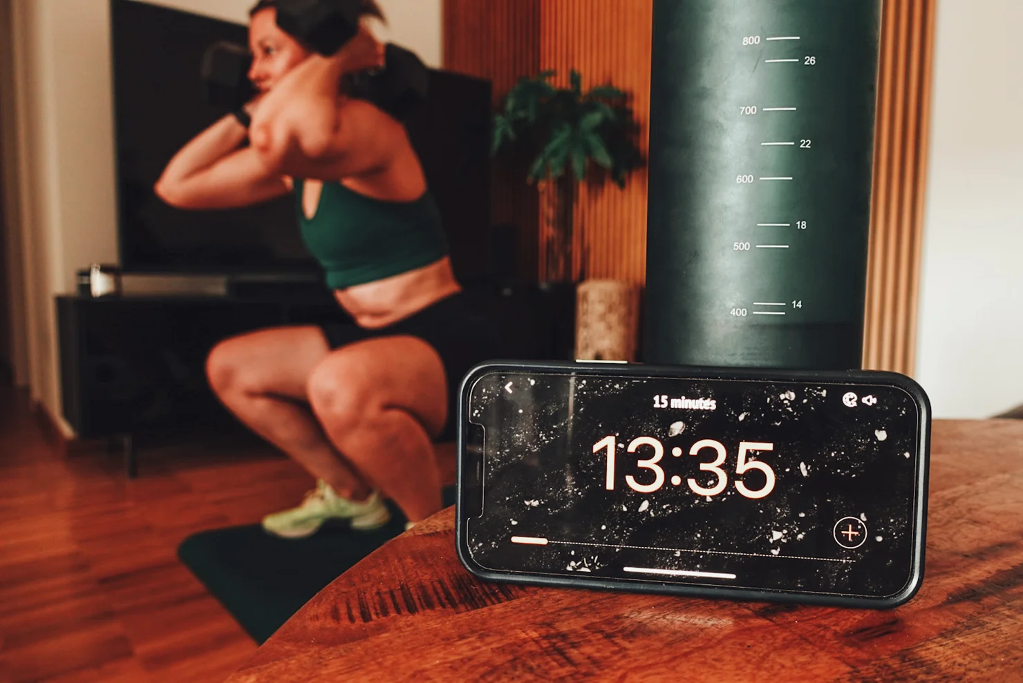Woman training with dumbbells