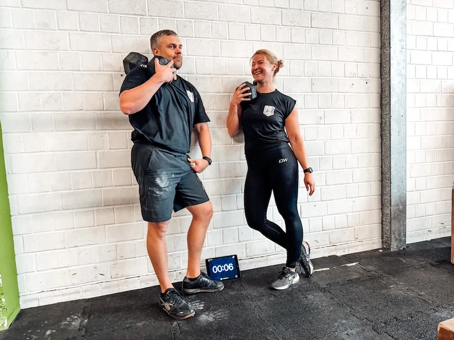 Two athletes taking a break from training